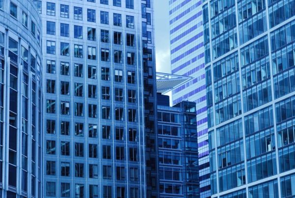 Apartment buildings and office buildings are two types of commercial real estate