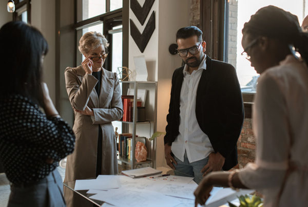 Commercial real estate investors considering the benefits of different commercial real estate loan types.